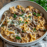 Creamy Beef Pasta Recipe – Easy, Cheesy & Family-Approved 2 Finished creamy beef and bowtie pasta with garnish