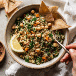 8 Chickpea Quinoa Power Bowl – Protein-Packed, Plant-Based Lunch in a Bowl 2 Served 8 Chickpea Quinoa Power Bowl with spoon and garnish