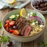 close up ultra zoom of a colorful greek steak bowl