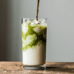 Iced Brown Sugar Vanilla Matcha Latte – Sweet, Cozy & Refreshing 2 close up of an iced brown sugar vanilla matcha latte in a tall glass with ice swirls of green match xchqgt8x0g5efwdyf2sn 3