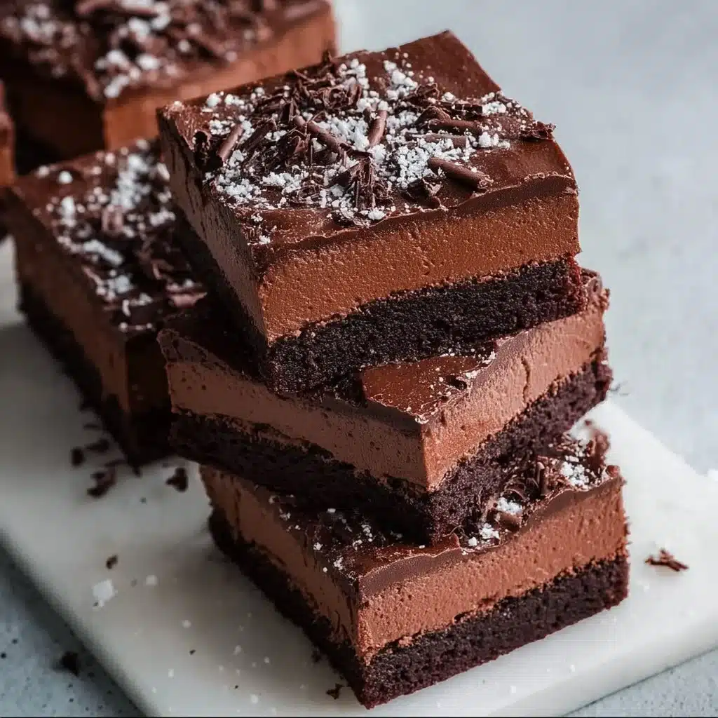 Delicious Chocolate Mousse Brownies topped with chocolate ganache.