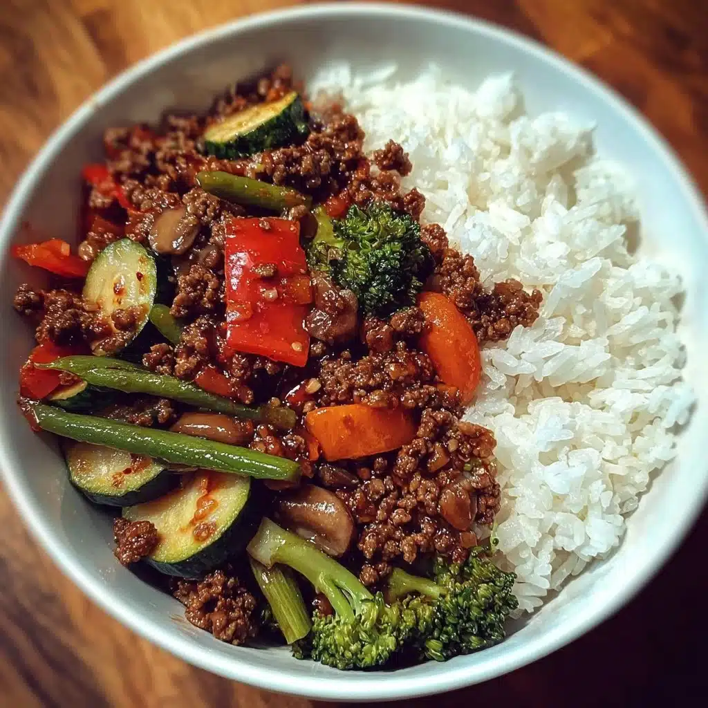 Spicy Ground Beef Stir-Fry Bowl with Garlic Veggies & Steamy Rice 6 Spicy ground beef stir-fry bowl with garlic veggies and rice