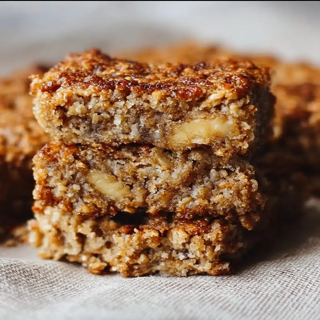 Healthy banana oatmeal bars stacked on a plate