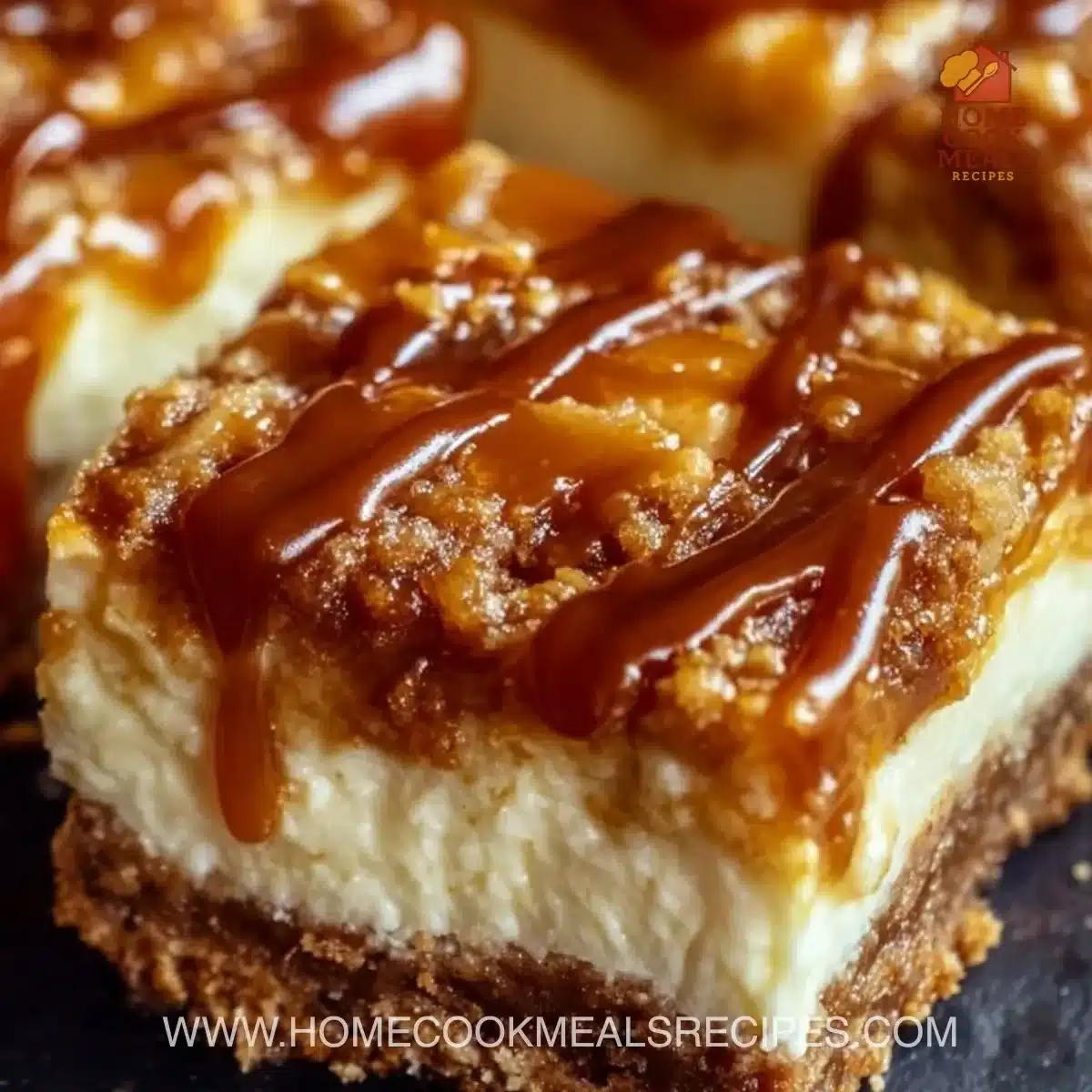 Delicious caramel apple cheesecake bars topped with caramel sauce and apple slices