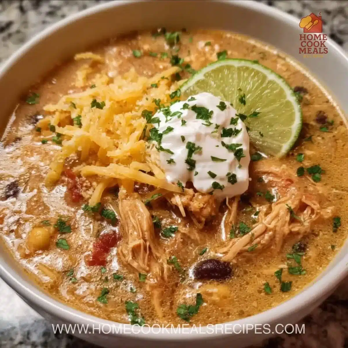 Crockpot White Chicken Chili with fresh toppings in a bowl