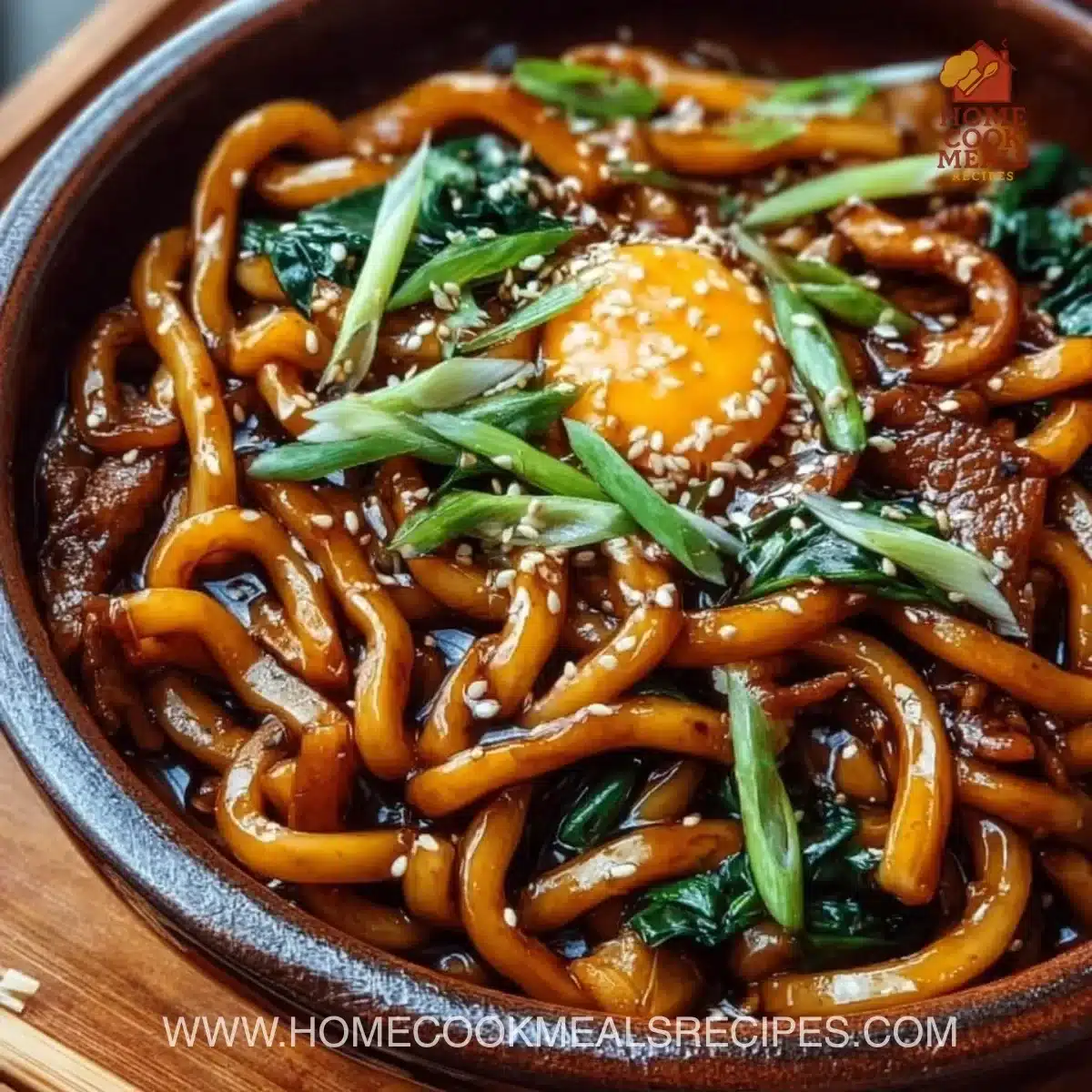 Delicious grilled udon noodles served with vibrant vegetables and sauce