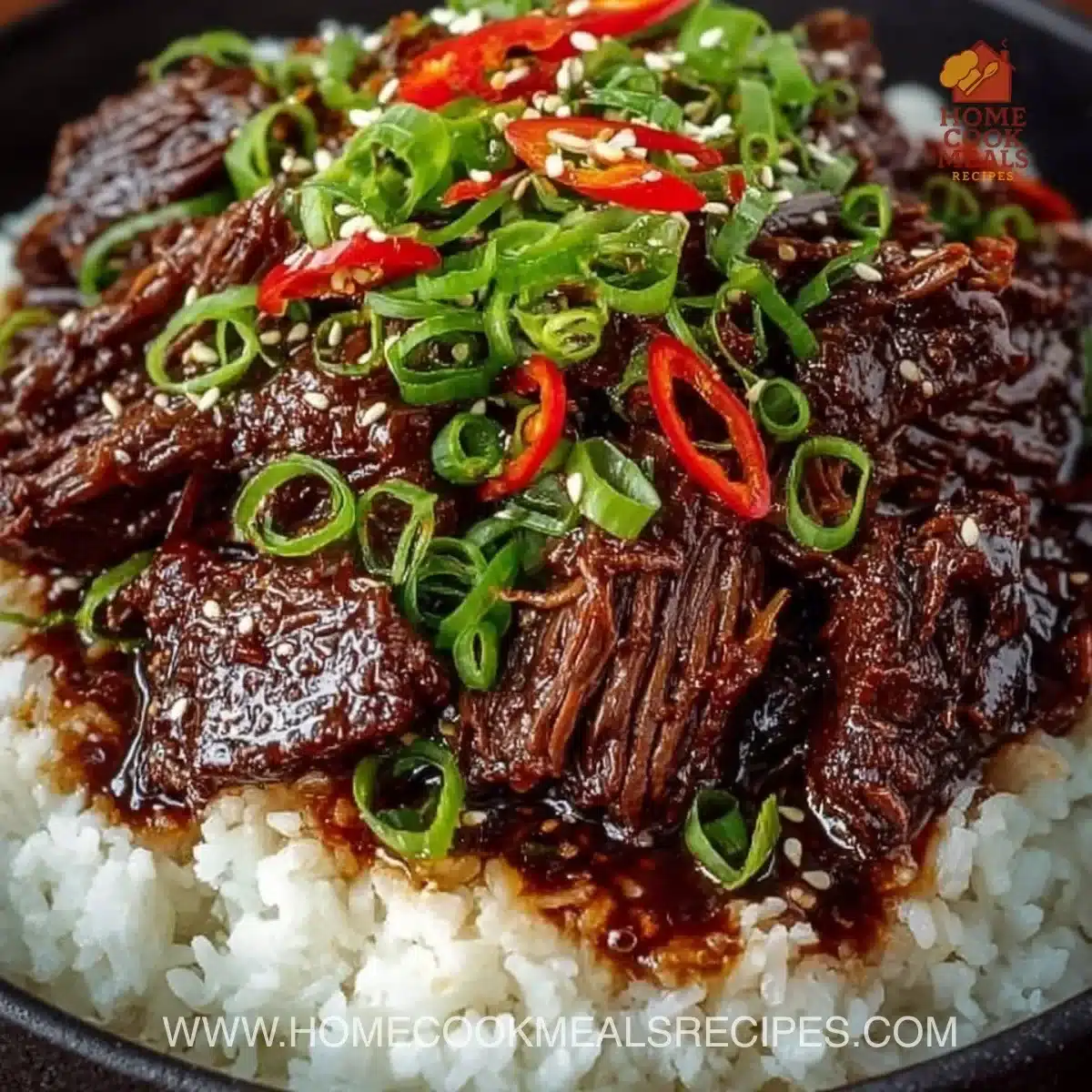 Delicious Slow Cooker Korean Beef served with rice and vegetables