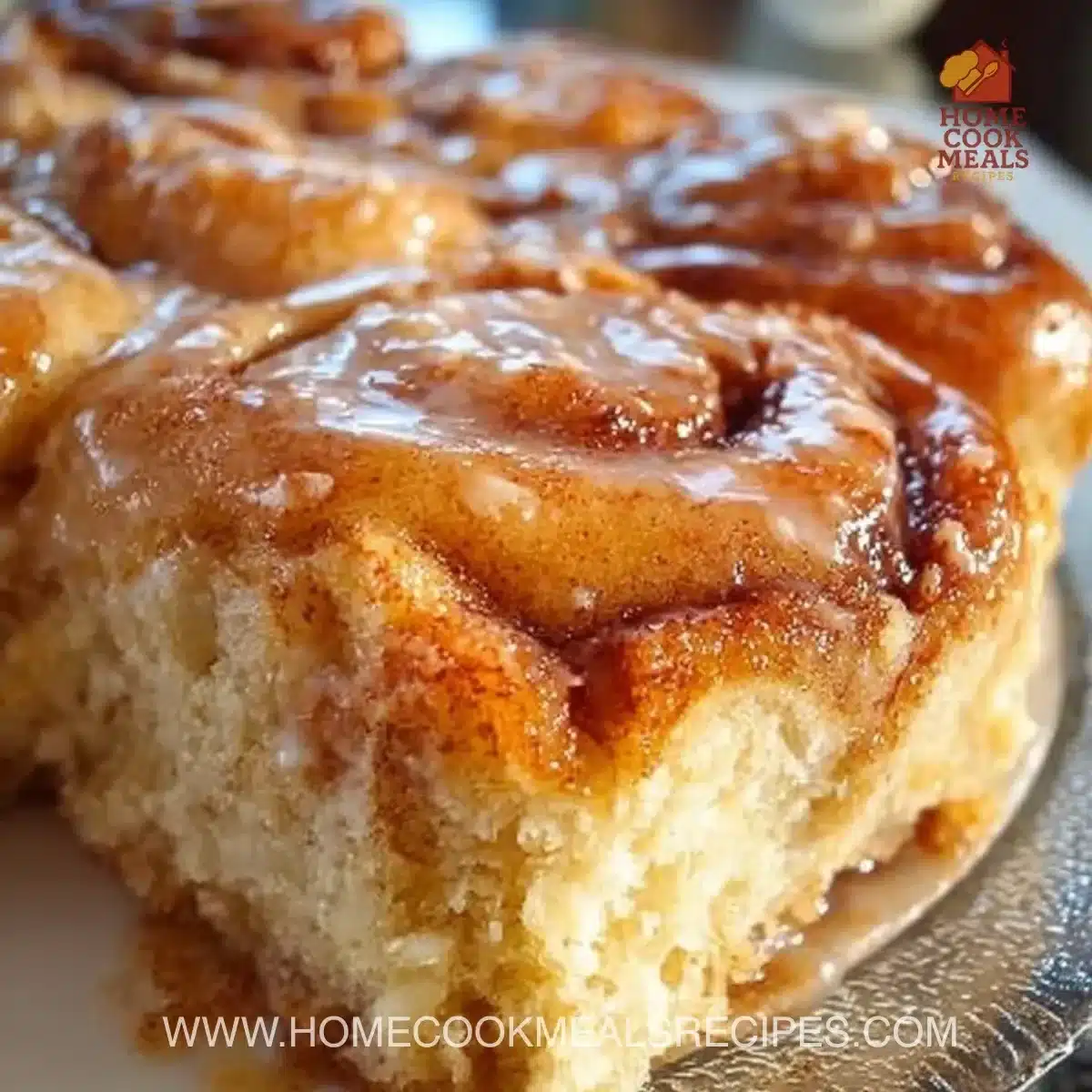 A variety of cinnamon desserts including cinnamon roll cake and baked treats.