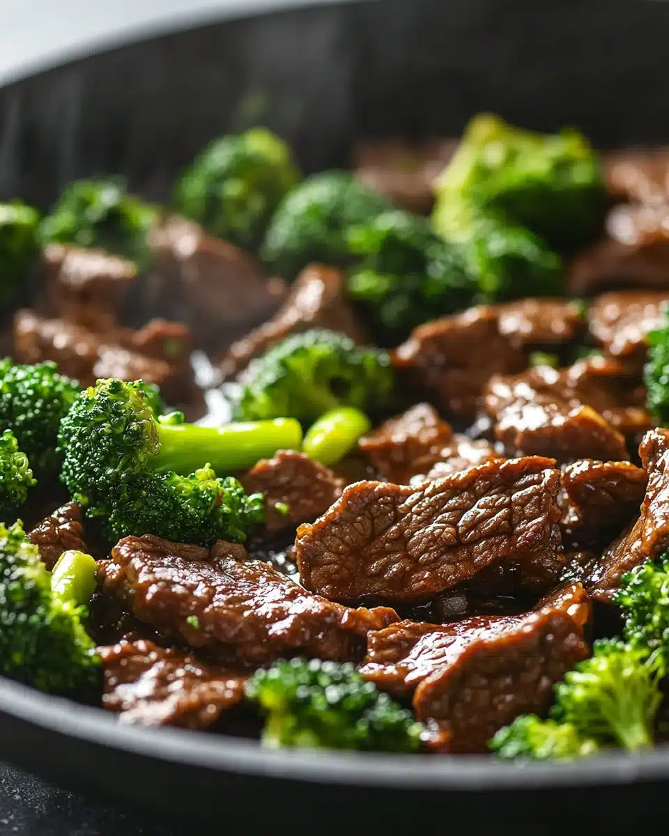 Delicious beef and broccoli stir-fry served in a bowl with rice.