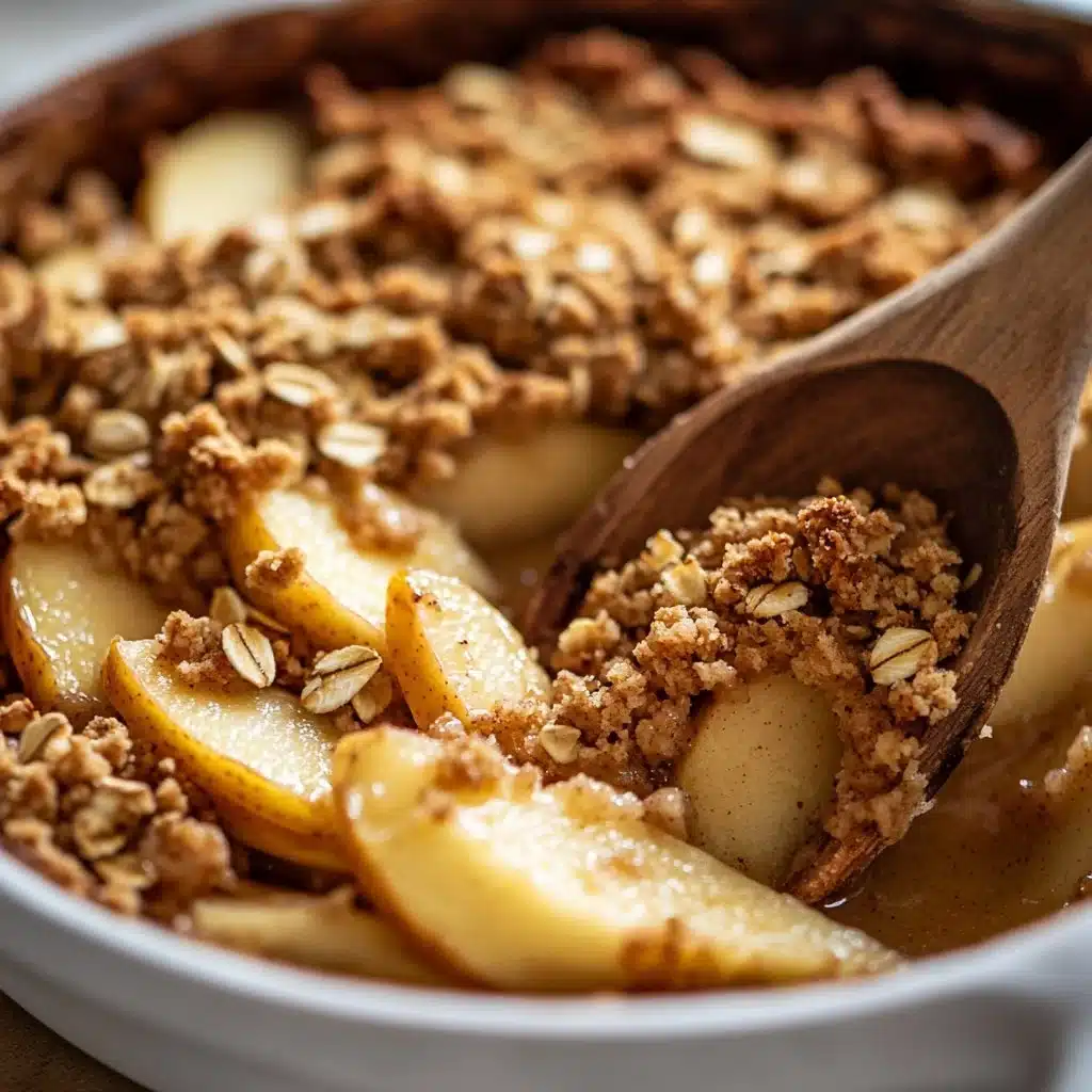 Delicious baked apple crumble with a golden crumb topping and fresh apple filling.
