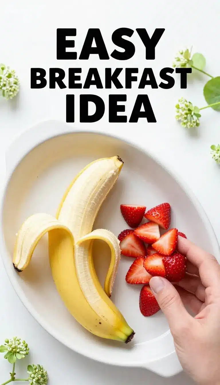 A plate of pancakes topped with fresh berries and syrup, served with a glass of orange juice.